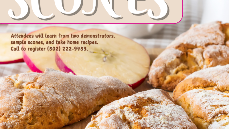 scones on wood board next to apple slices